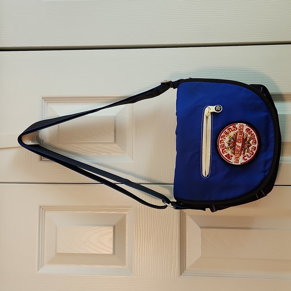 Sherpani Milli crossbody bag with Beatles Sgt. Peppers Lonely Hearts band patch